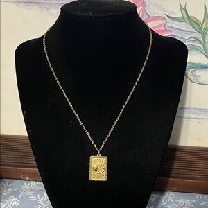 Gold plated stainless steel sun and moon pendant necklace